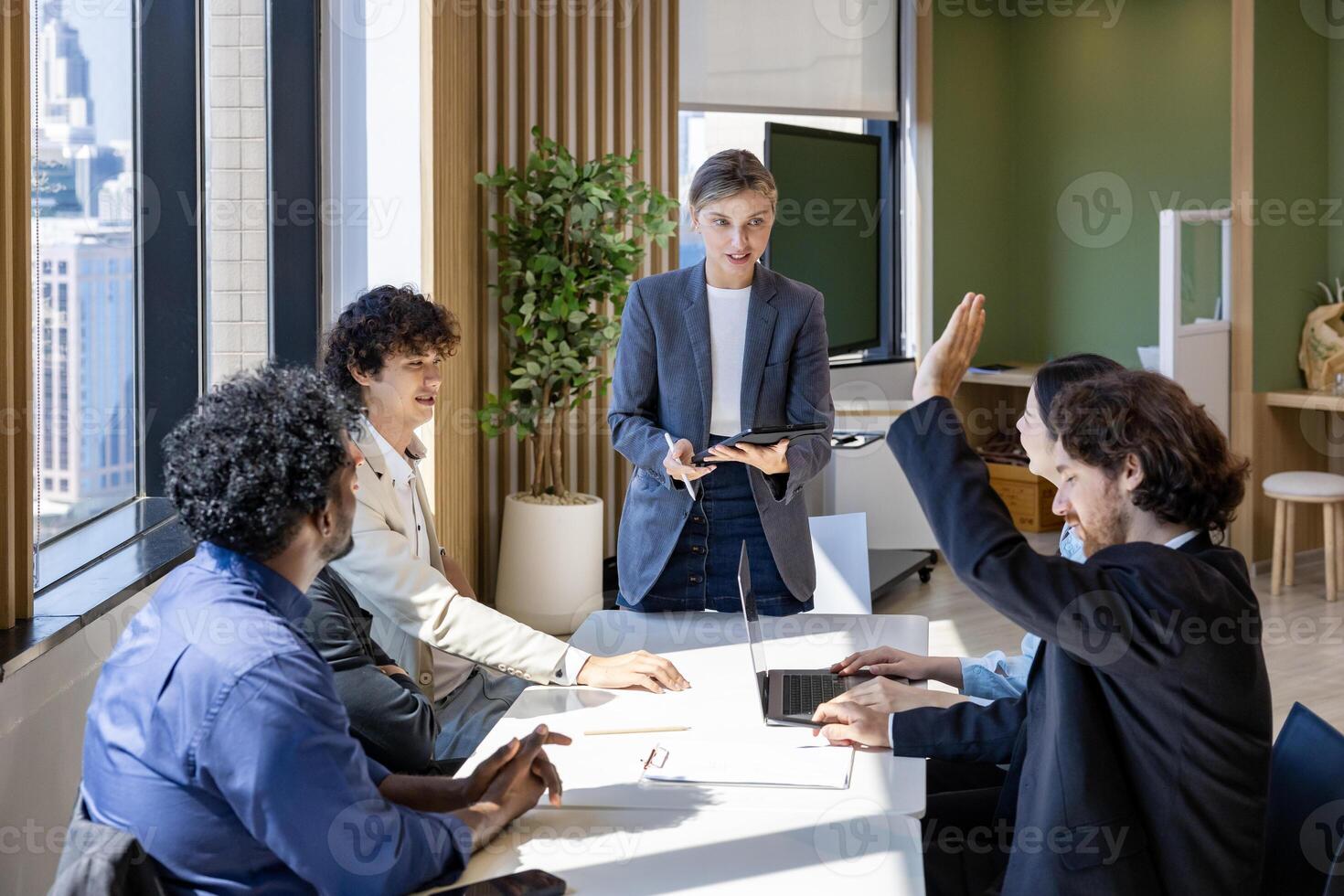 Manager is presenting new project to the team while having question from panel in the executive meeting for next year plan with market share increase for global business and investment usage photo