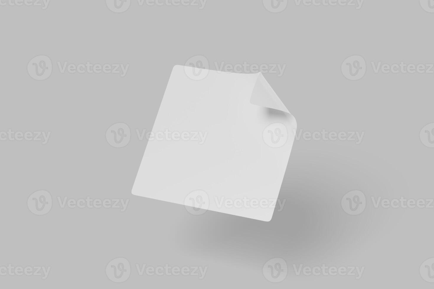 float blank paper sheet on a gray background photo
