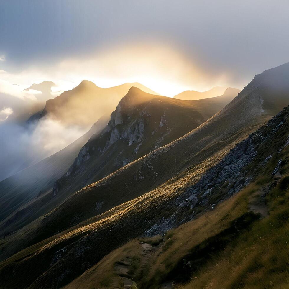 Majestic Mountain Peaks at Sunset with Golden Light photo