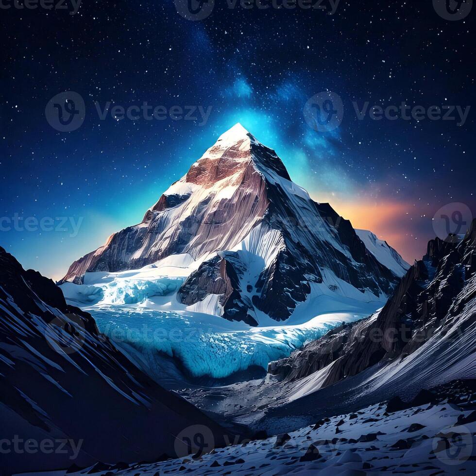 Majestic Snow Covered Mountain Peak Under Starry Night Sky photo