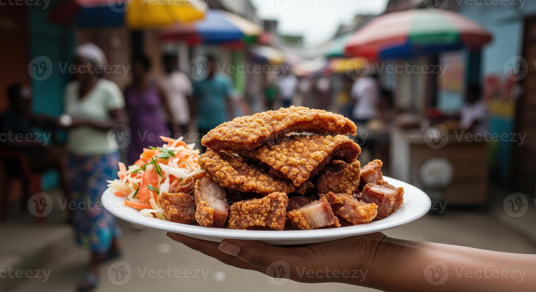 Authentic haitian griot crispy fried pork served with a fresh pikliz slaw in a market photo