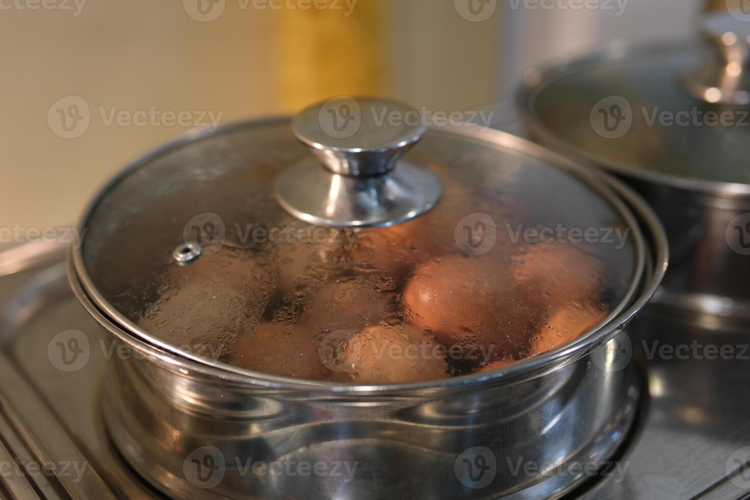 buffet boiled eggs white plate filled with freshly boiled eggs, placed on a breakfast buffet, creating a clean and appetizing visual photo