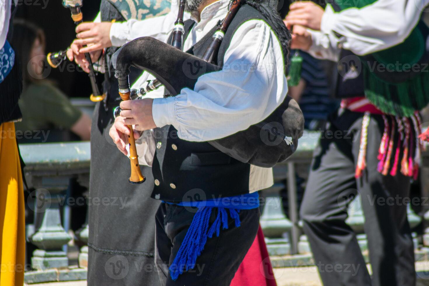 music group with typical Galician bagpipes in traditional festive event. photo