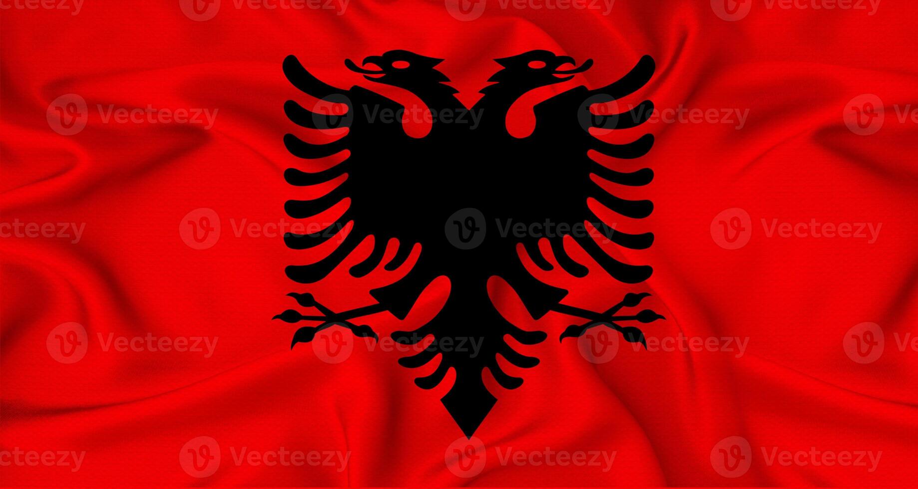 Realistic Albania flag waving. Close up of flag of Albania with cloth texture photo