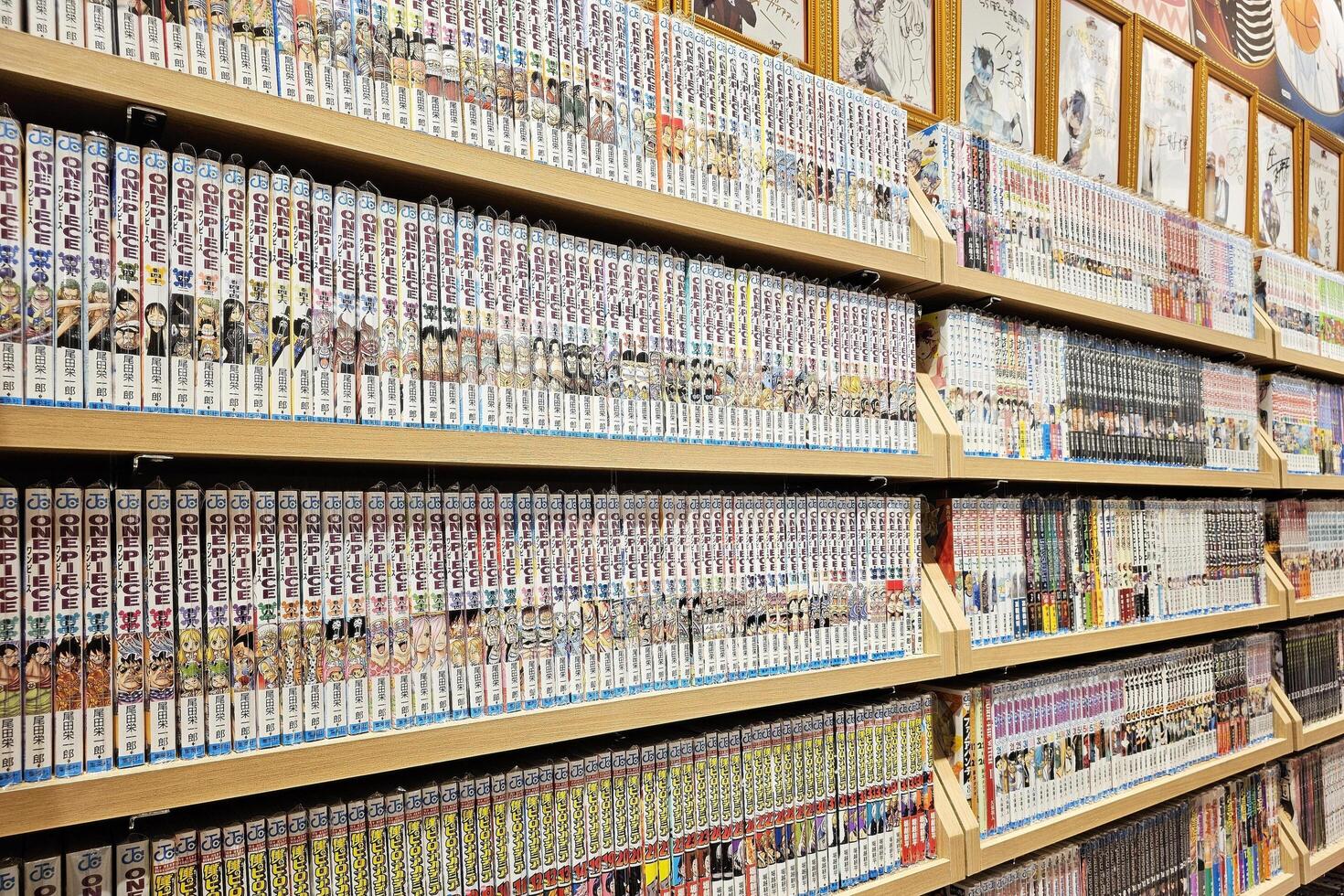 FUKUOKA, JAPAN NOVEMBER 18, 2023 One Piece manga on the bookshelf. One Piece is a Japanese manga series written and illustrated by Eiichiro Oda. photo