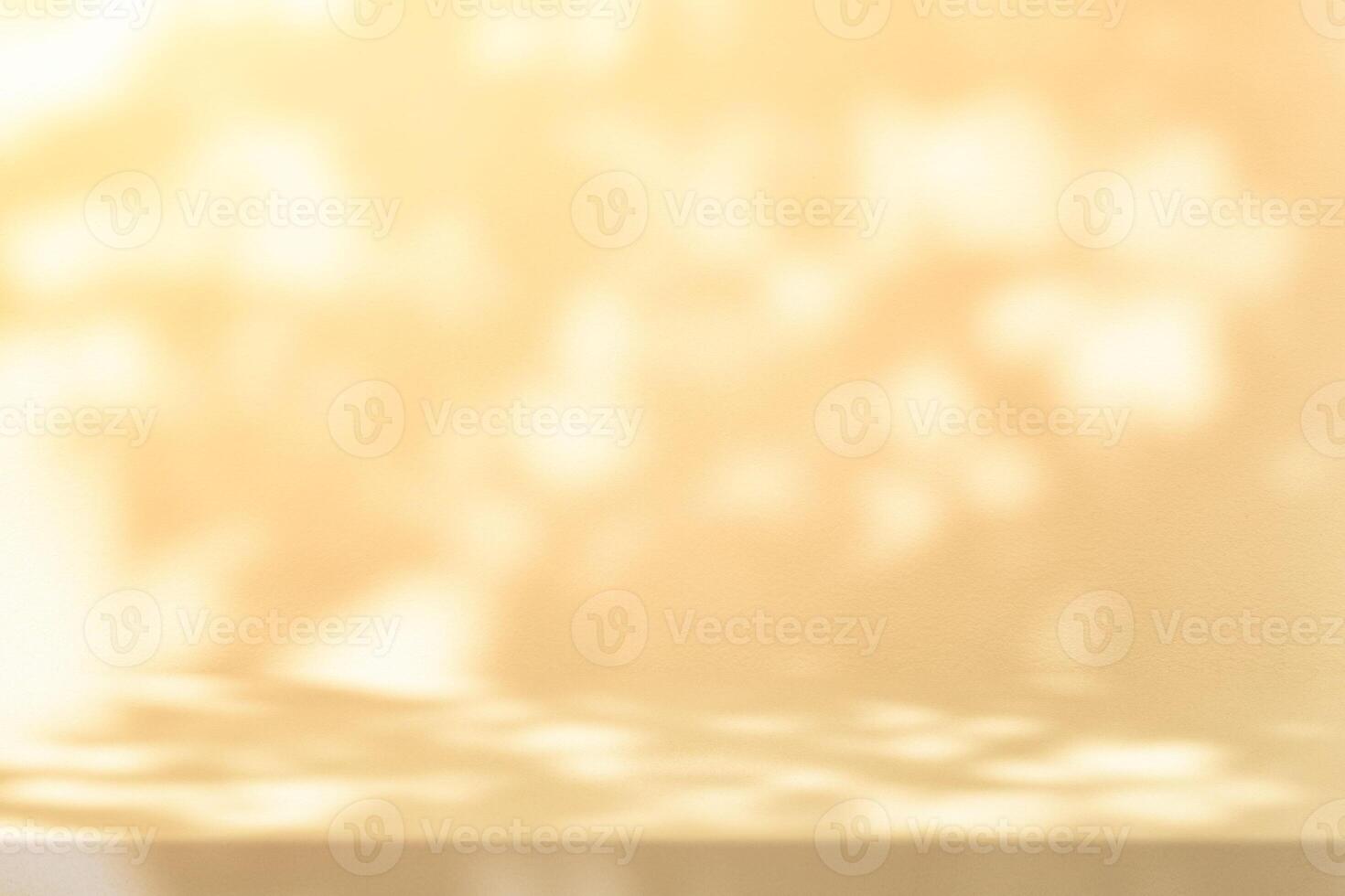 Gold Stucco Table with Nature Shadow on Concrete Wall Texture Background with Light Leak photo