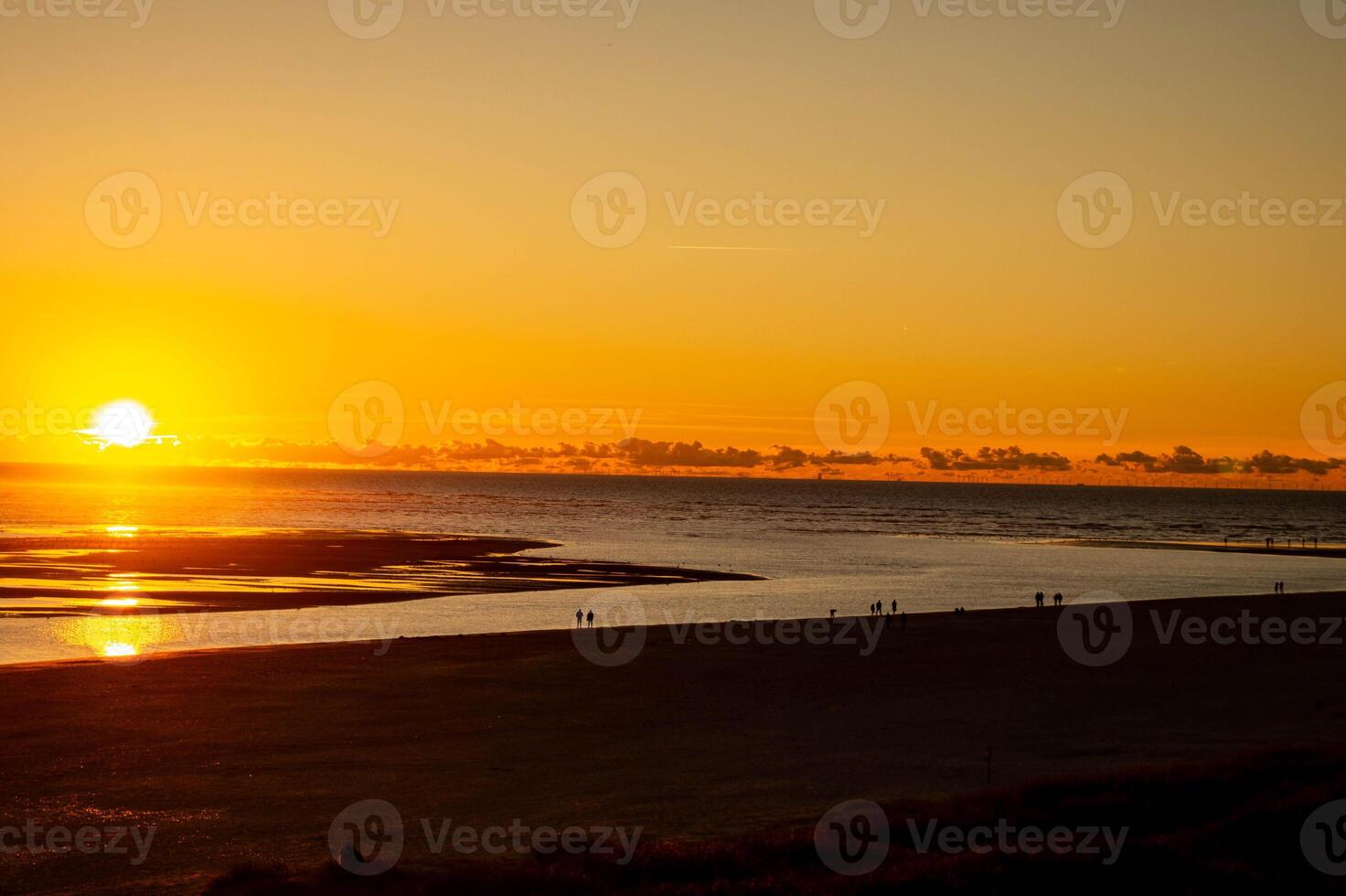 a Sunset on the beach of Blavand photo
