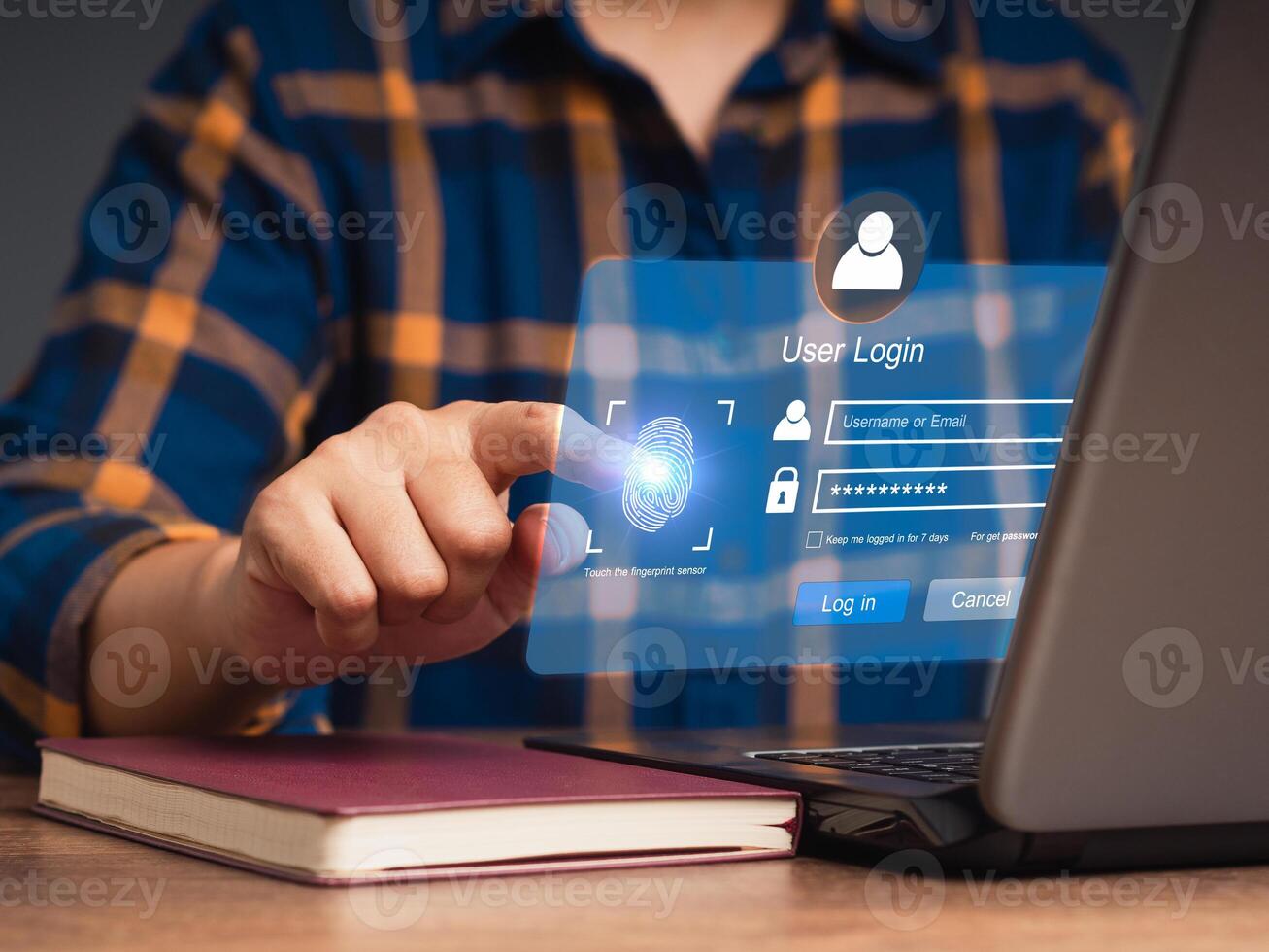 Log in to the system with a fingerprint on the virtual screen from a laptop photo