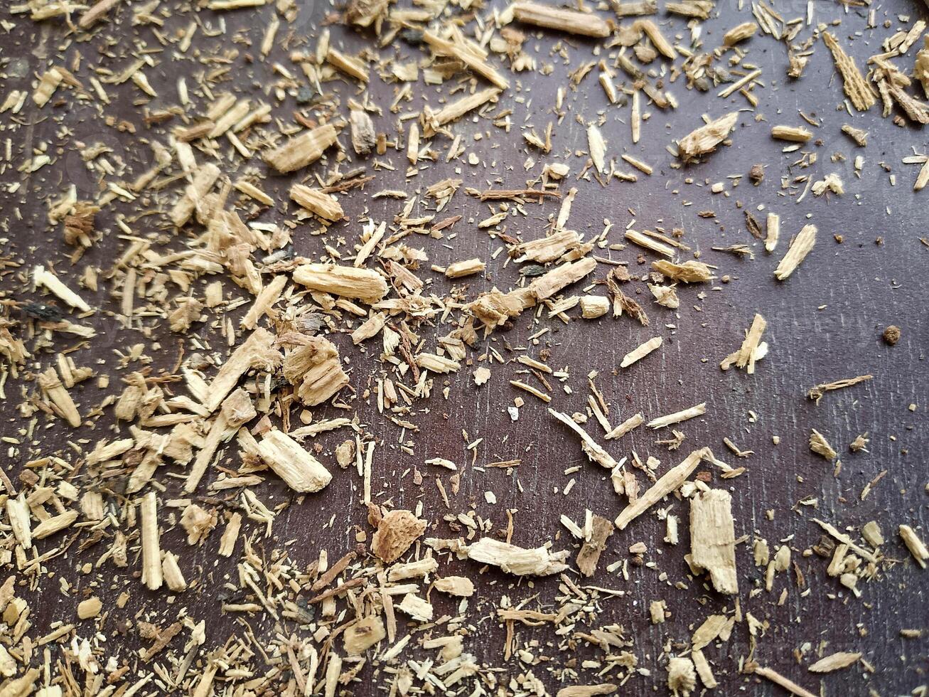 wooden and lumber sawdust on the ground photo
