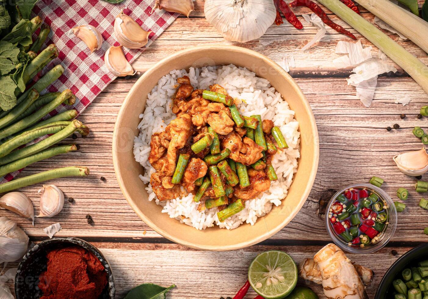 The Stir fried pork with curry paste for Thai food concept. photo