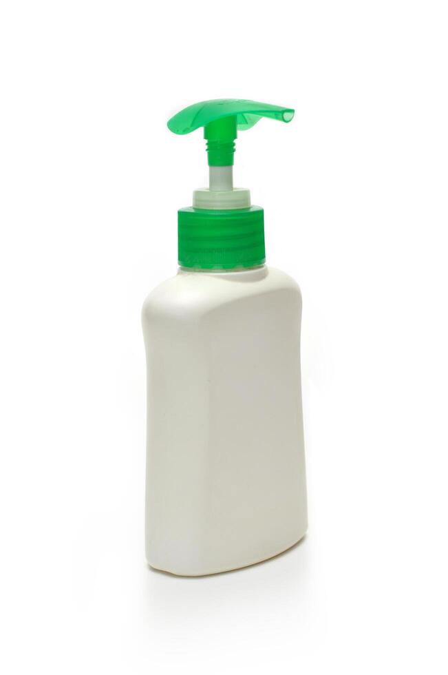 hand sanitizer bootle green color vertikal white background photo