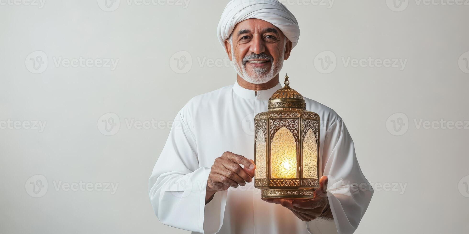 Arab old man holding a lantern. photo