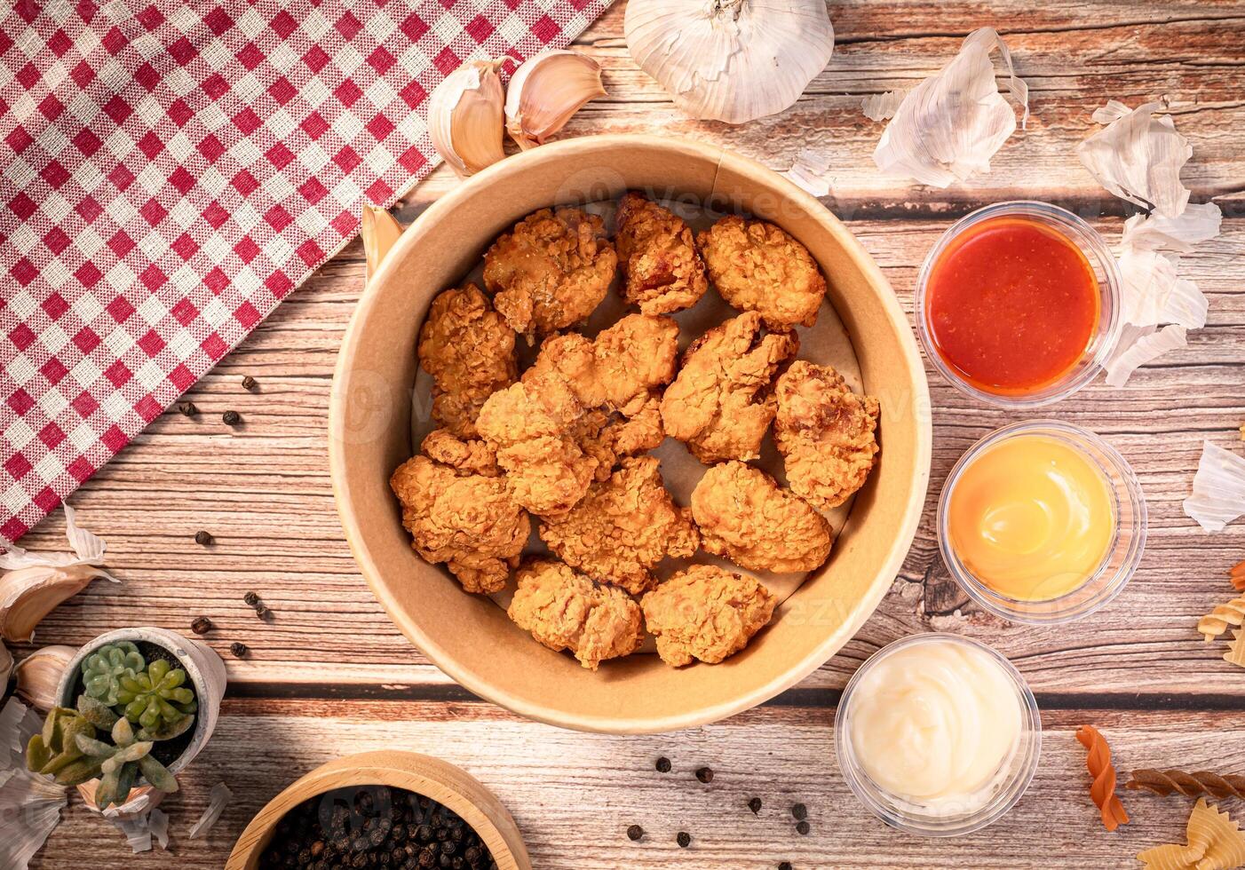 Frence fire and nuggets in paper bowl for food concept. photo