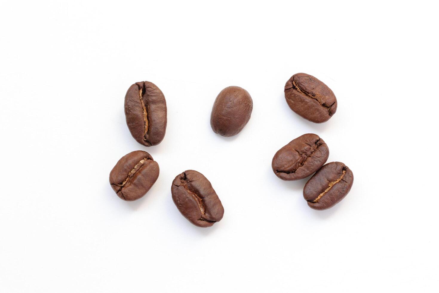 Isolated of coffee bean, Brown roasted coffee beans seeds isolated, coffee bean isolate, white background, bean isolated on white, brown beans photo