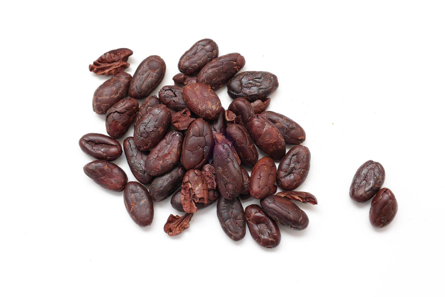 Top view of cocoa, Brown cocoa beans on white background photo