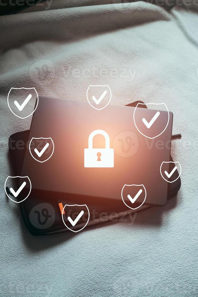 Protection from cyberattacks. Laptop security encryption with authentication app. photo