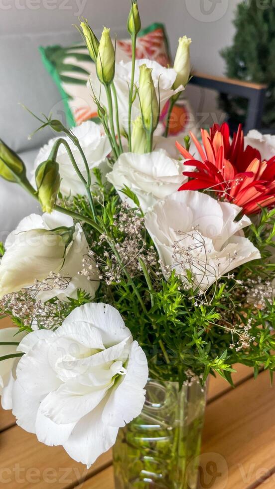 Delicate white lisianthus and fiery red gerbera bouquet, blooming serenade, Imbolc floral magic, multicultural unity, vibrant solstice photo