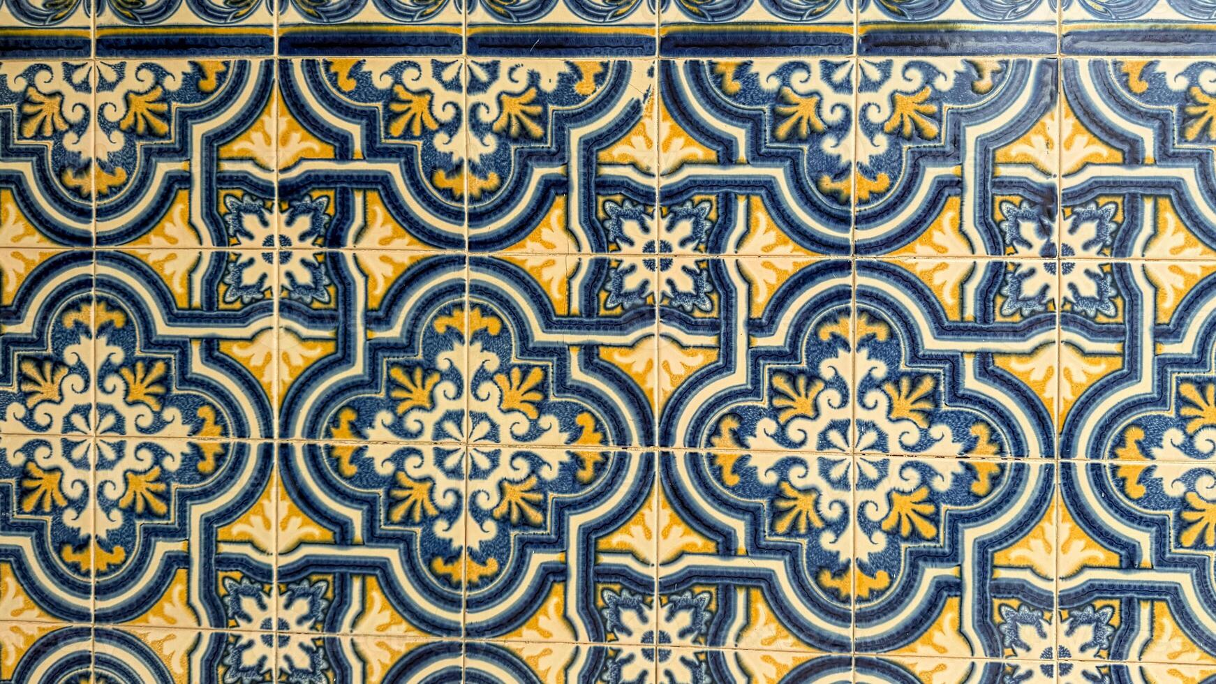 Ornate azure and ochre tiles weave Moorish tales, echoing Andalusian fiestas and the Festival of Patios charm photo