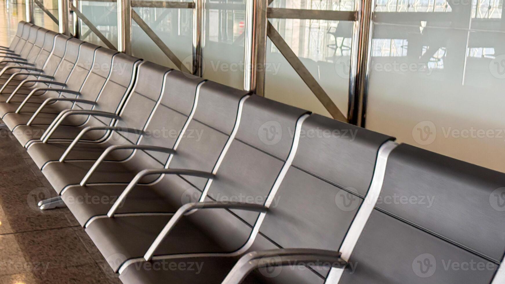 Endless airport chairs silently anticipate wanderlust filled globetrotters, evoking the calm before Diwali departures or Hanami travels photo
