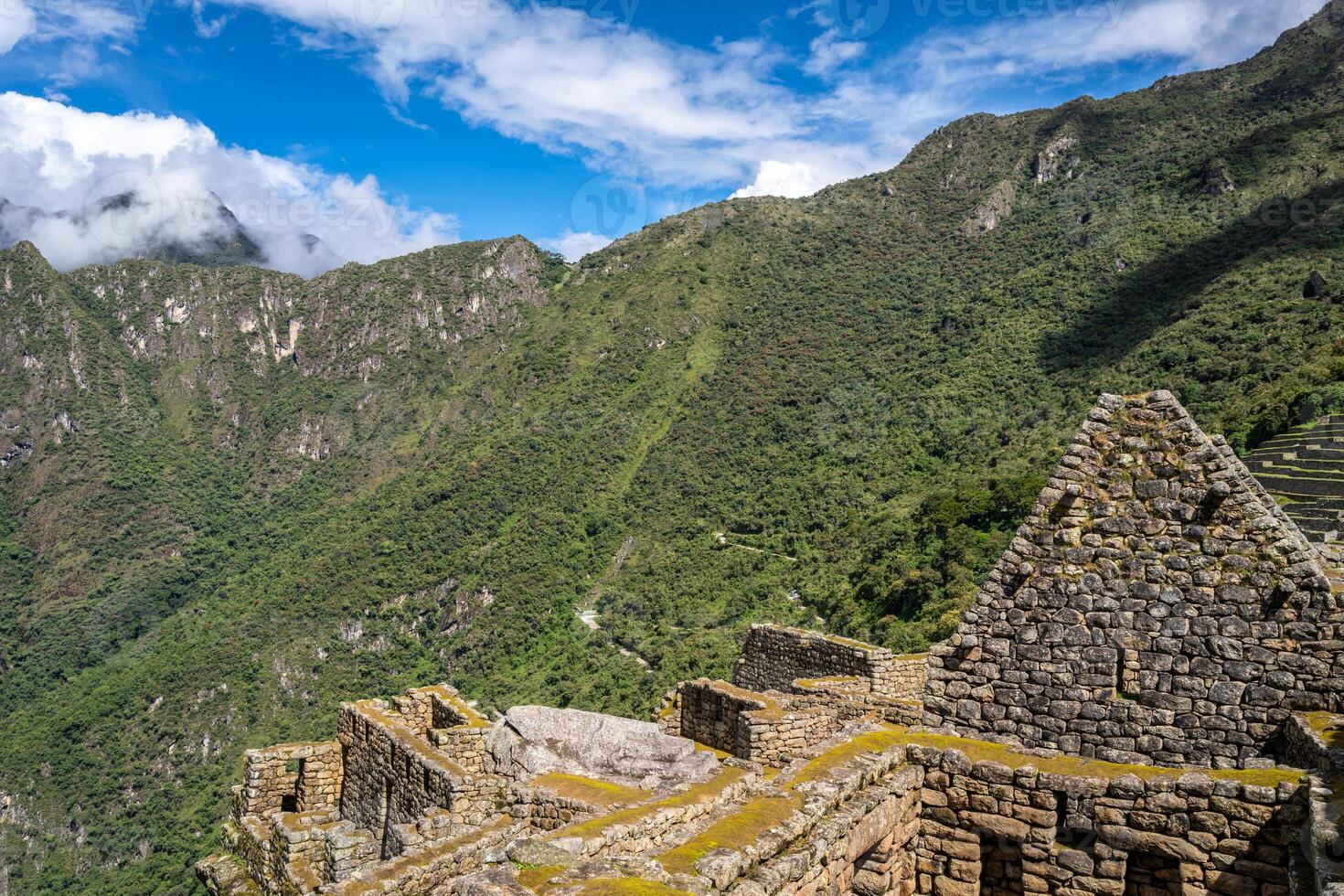 Ancient terraces and stone walls inside the Machu Picchu site in Peru photo