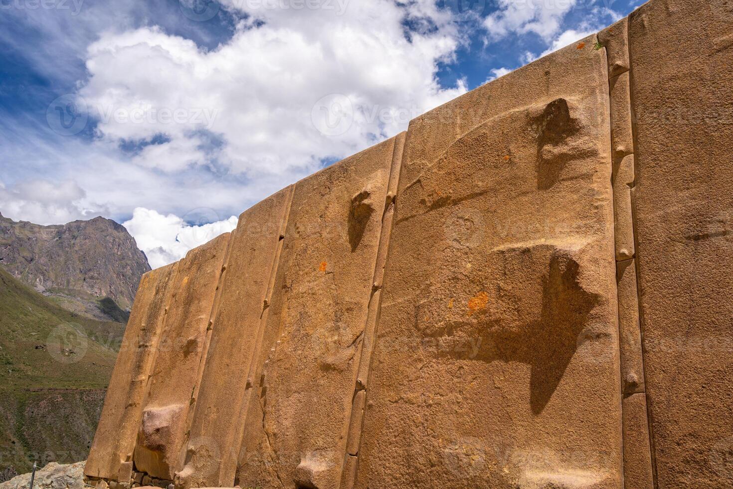 Ancient stone wall at the Inca fortress of Ollantaytambo, Peru photo