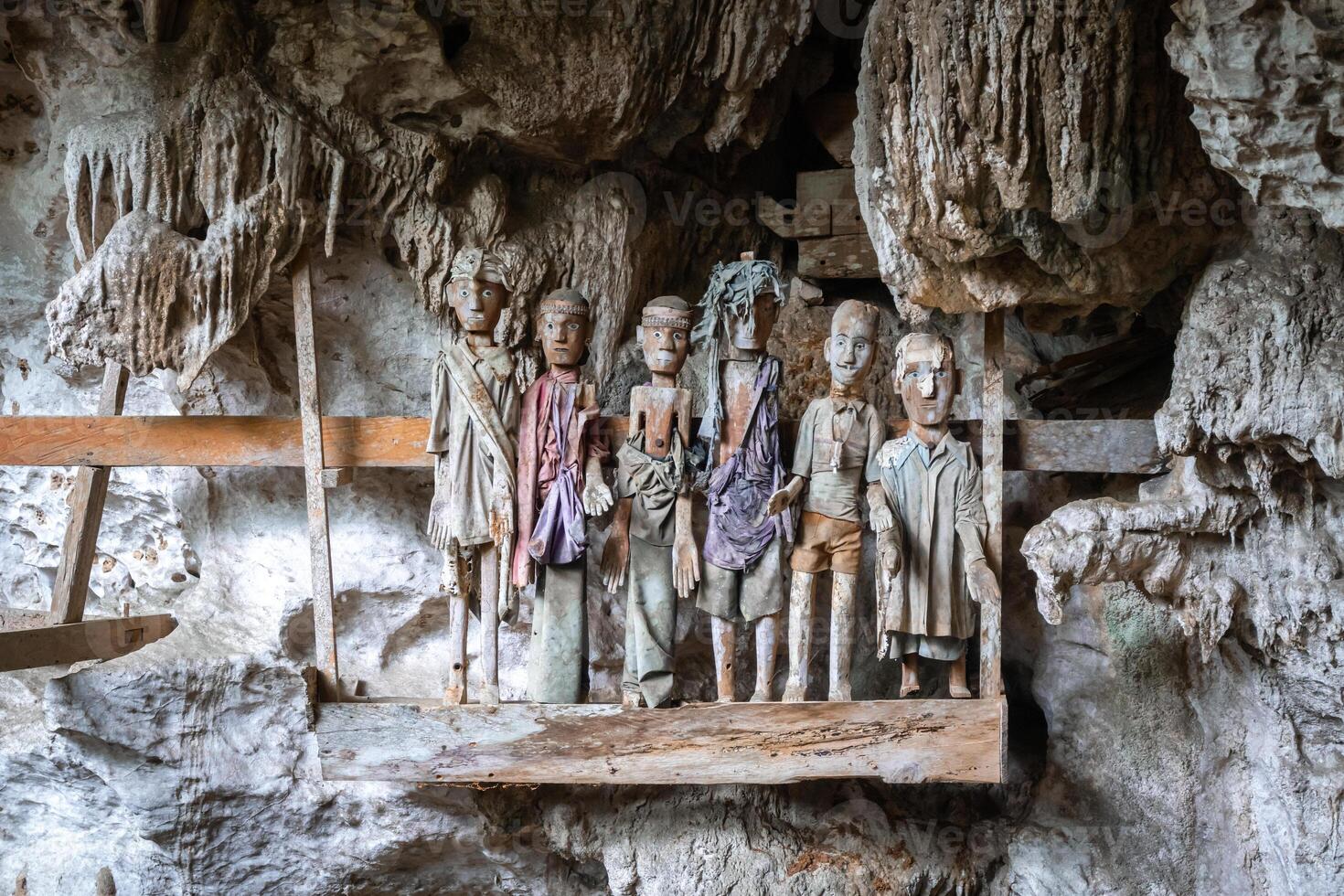 Tau Tau statues in a cave, Toraja, Sulawesi, Indonesia photo
