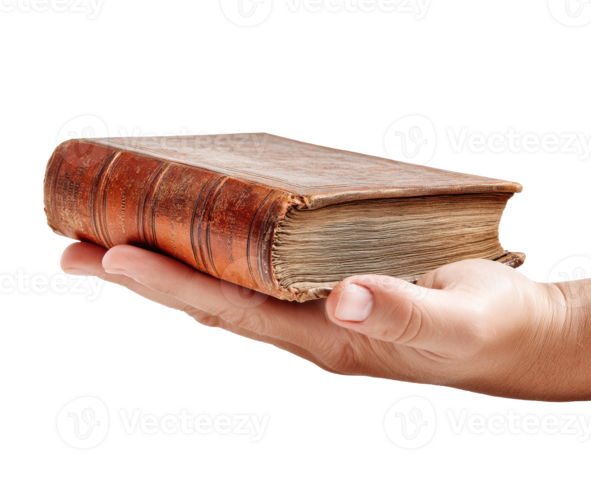 Old vintage book held in a hand for a nostalgic feel png