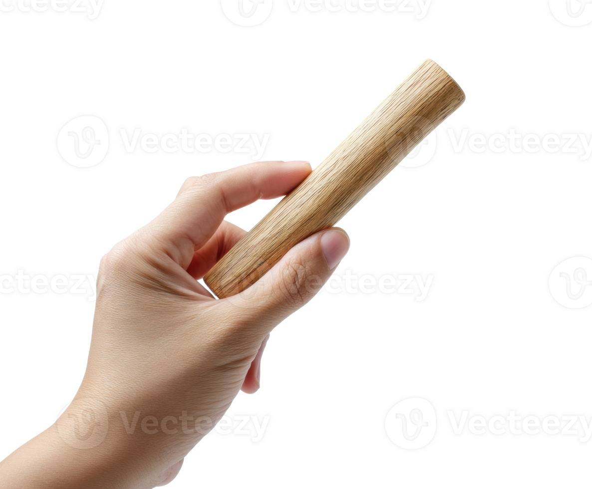 Hand holding a wooden rolling pin for baking and cooking tasks png