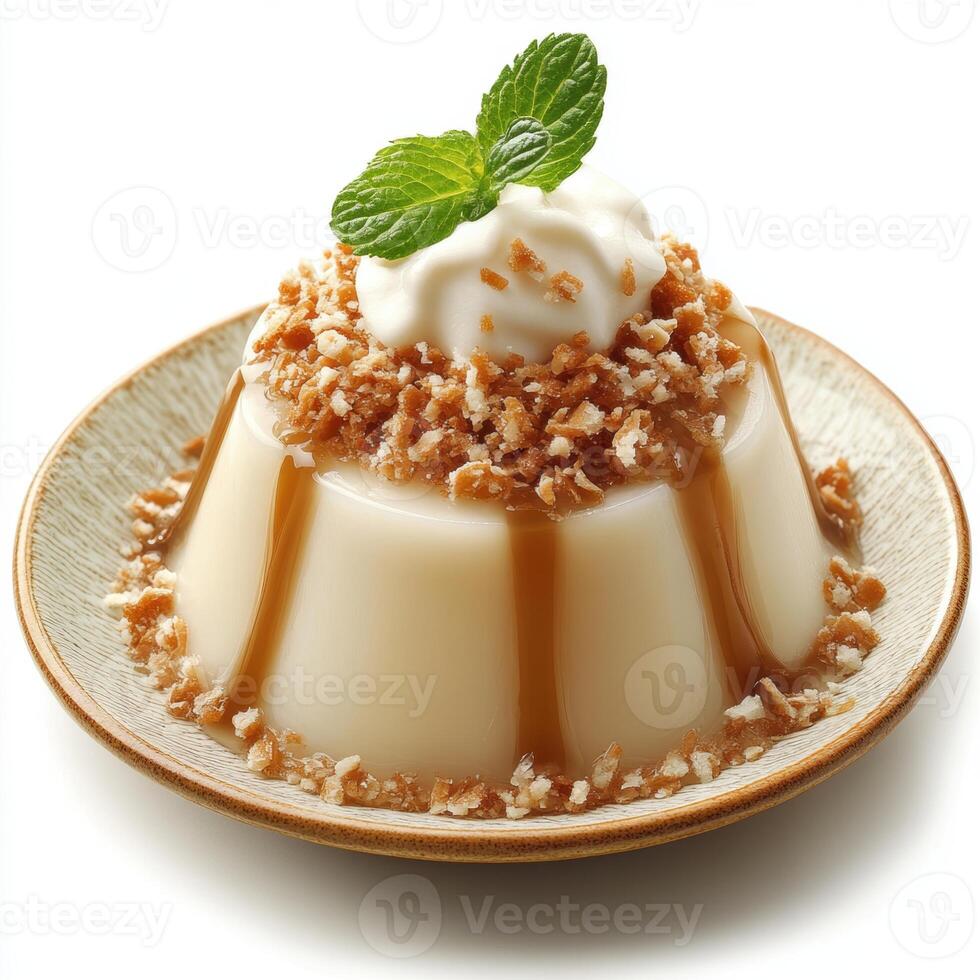 Creamy flavored dessert pudding topped with whipped cream and crunchy crumble garnished with fresh mint leaves served on a rustic plate photo