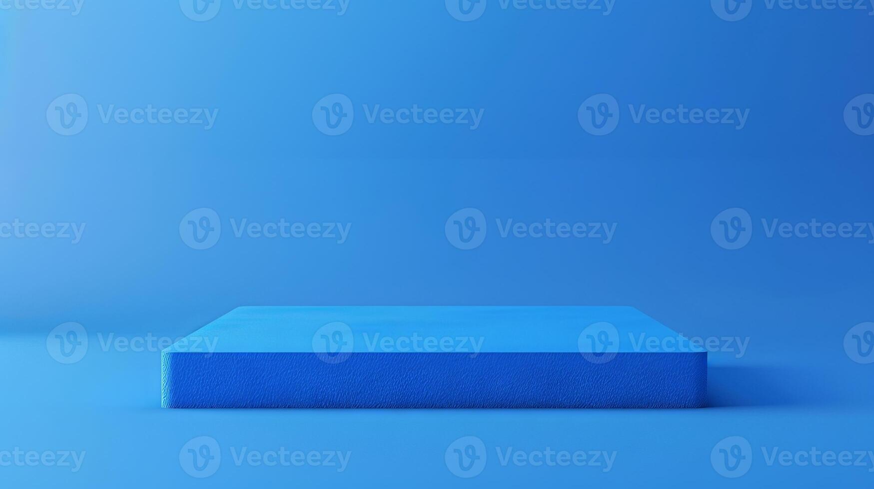A vibrant blue stage provides a clean and minimalist backdrop for product displays and presentations. photo