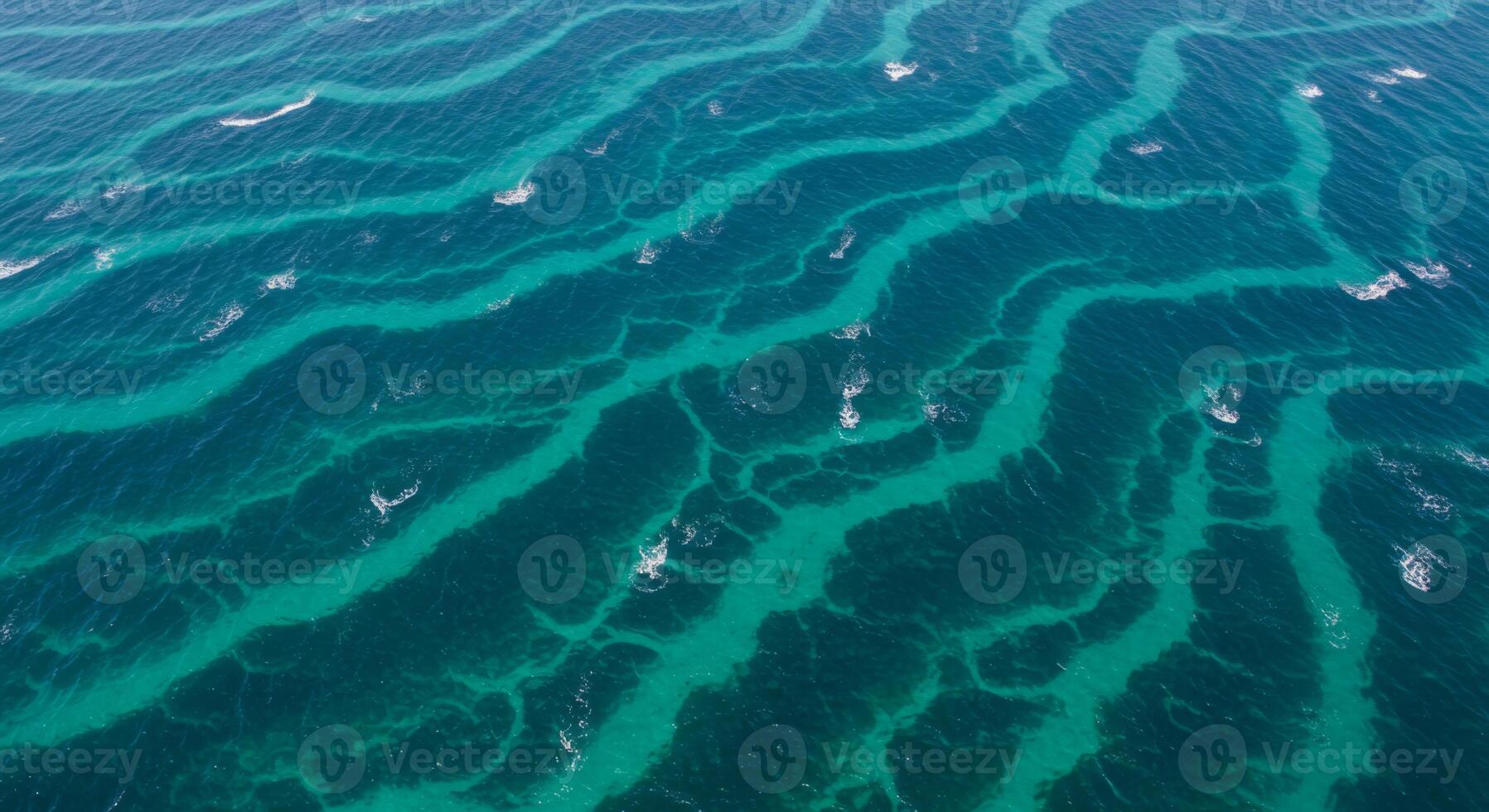Aerial View of Teal and Blue Ocean Water with Ripple Texture photo