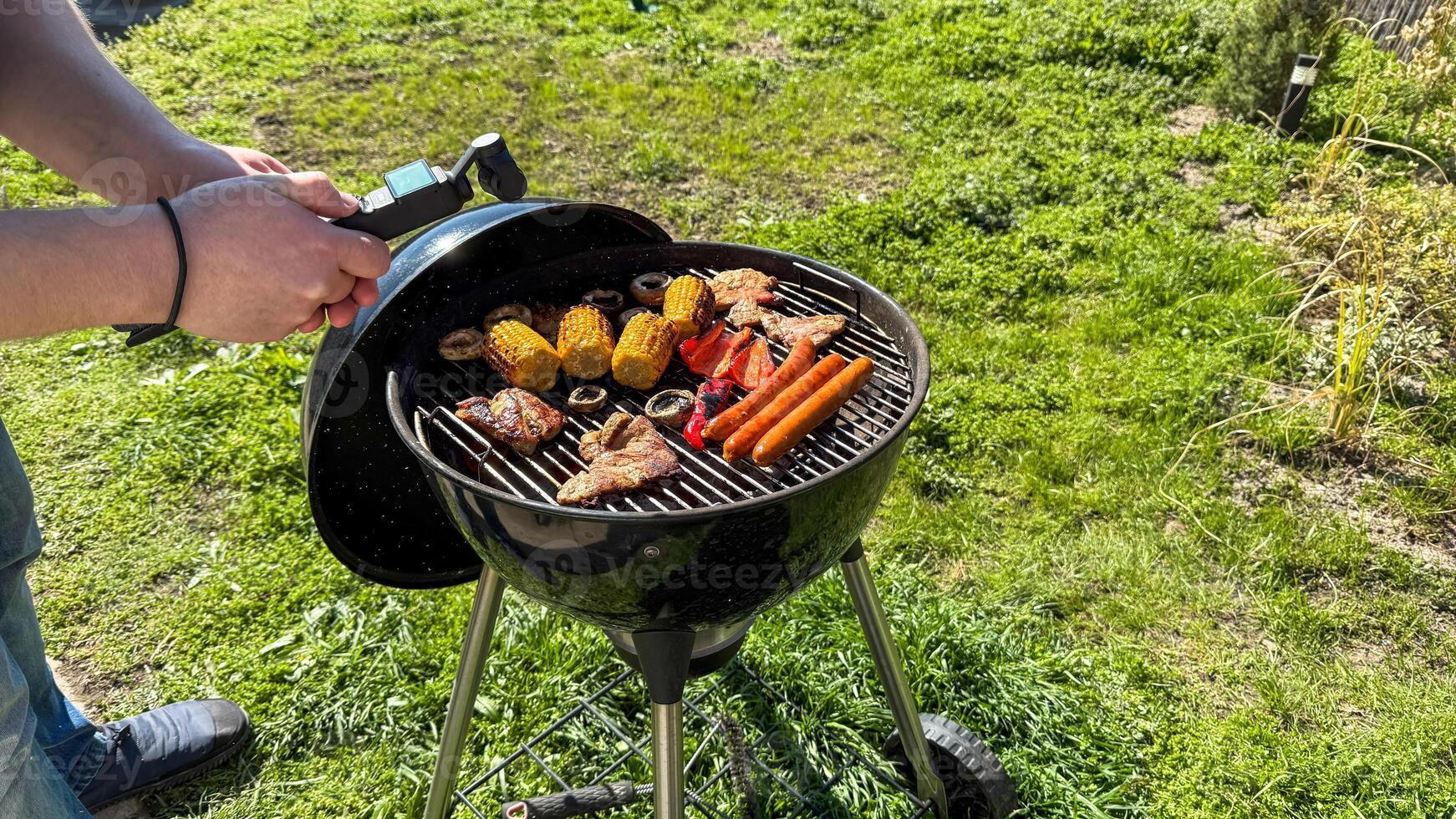 Summer sizzle dance, vibrant BBQ feast with grilled corn and peppers, National Barbecue Day, savory outdoor leisure celebration photo