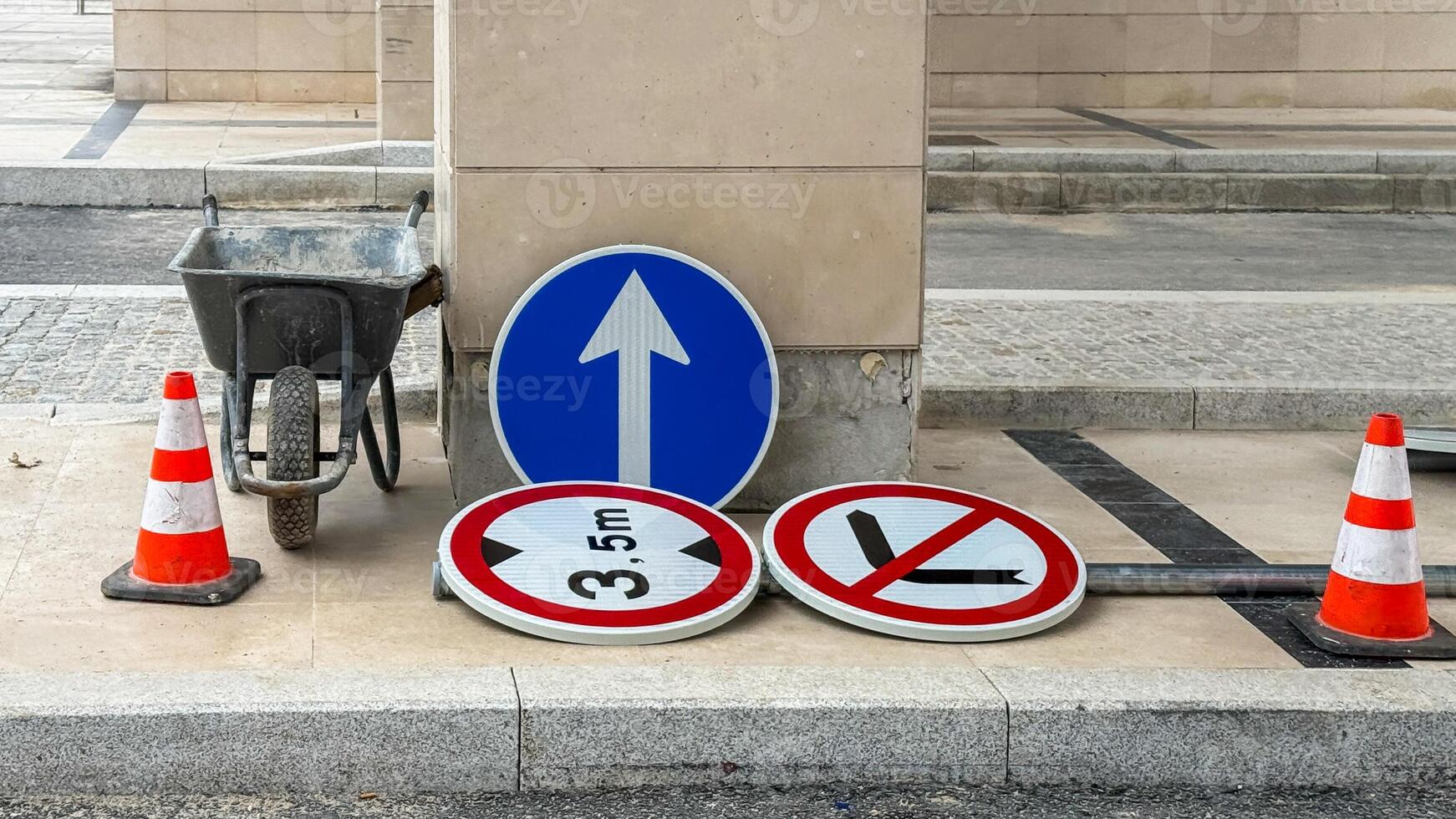 Urban symphony of abandoned signs and cones, symbolizing roadside zen, driving meditation, and Infrastructure Week contemplation photo