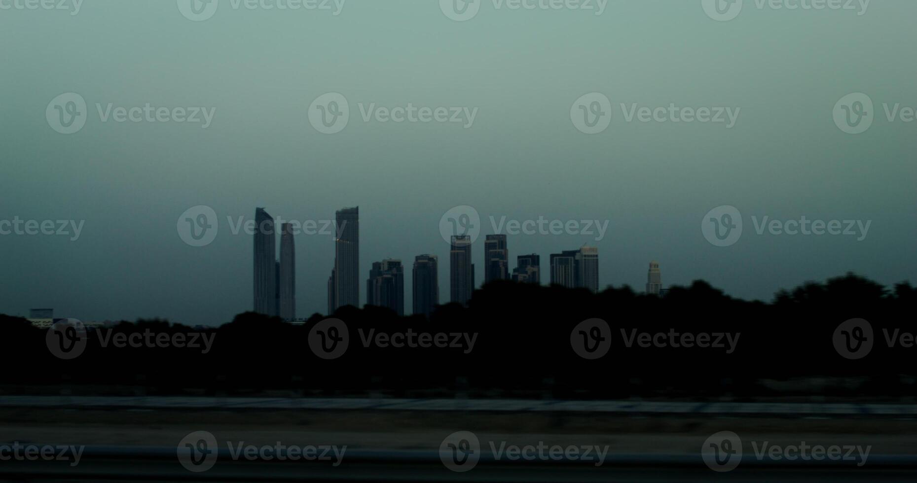 Panoramic view of metropolis with modern skyscrapers. from a moving car window, general view of the city photo
