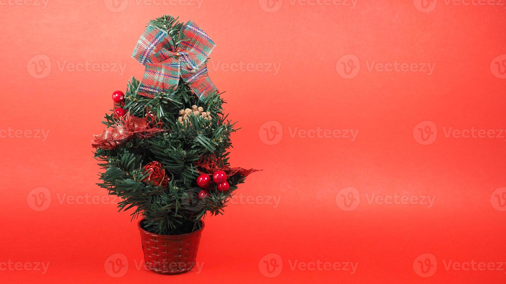 christmas tree over with red background photo