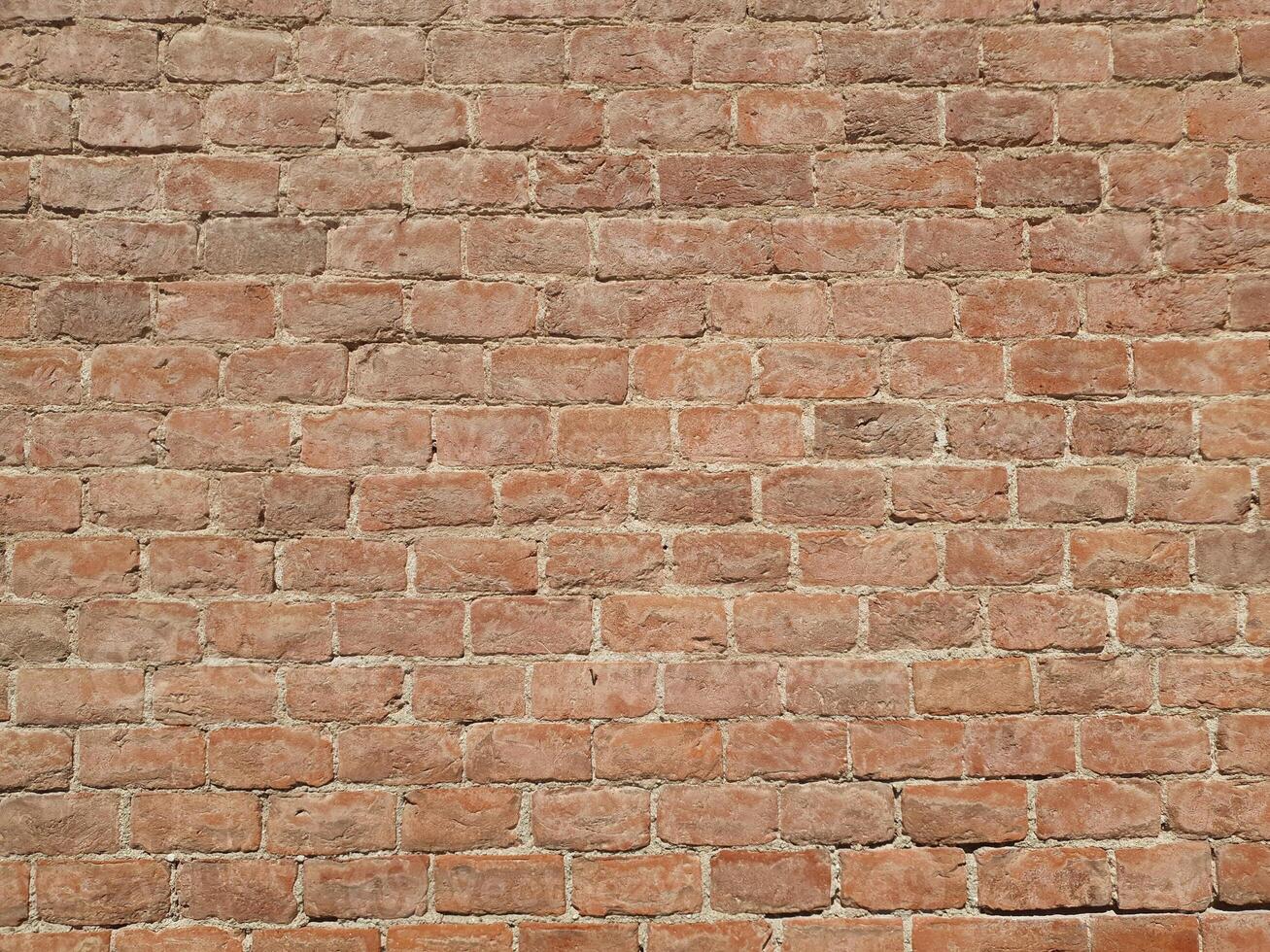 red brick wall as background photo