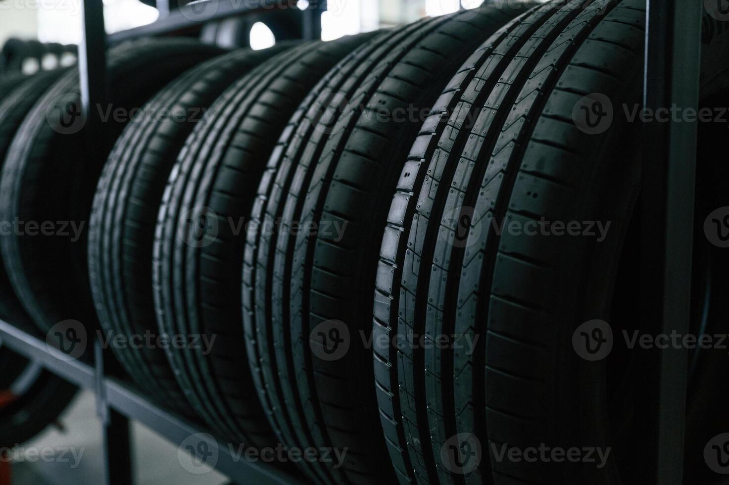 In the ,right, order. New tires are ,placed on the storage rack in the car workshop photo