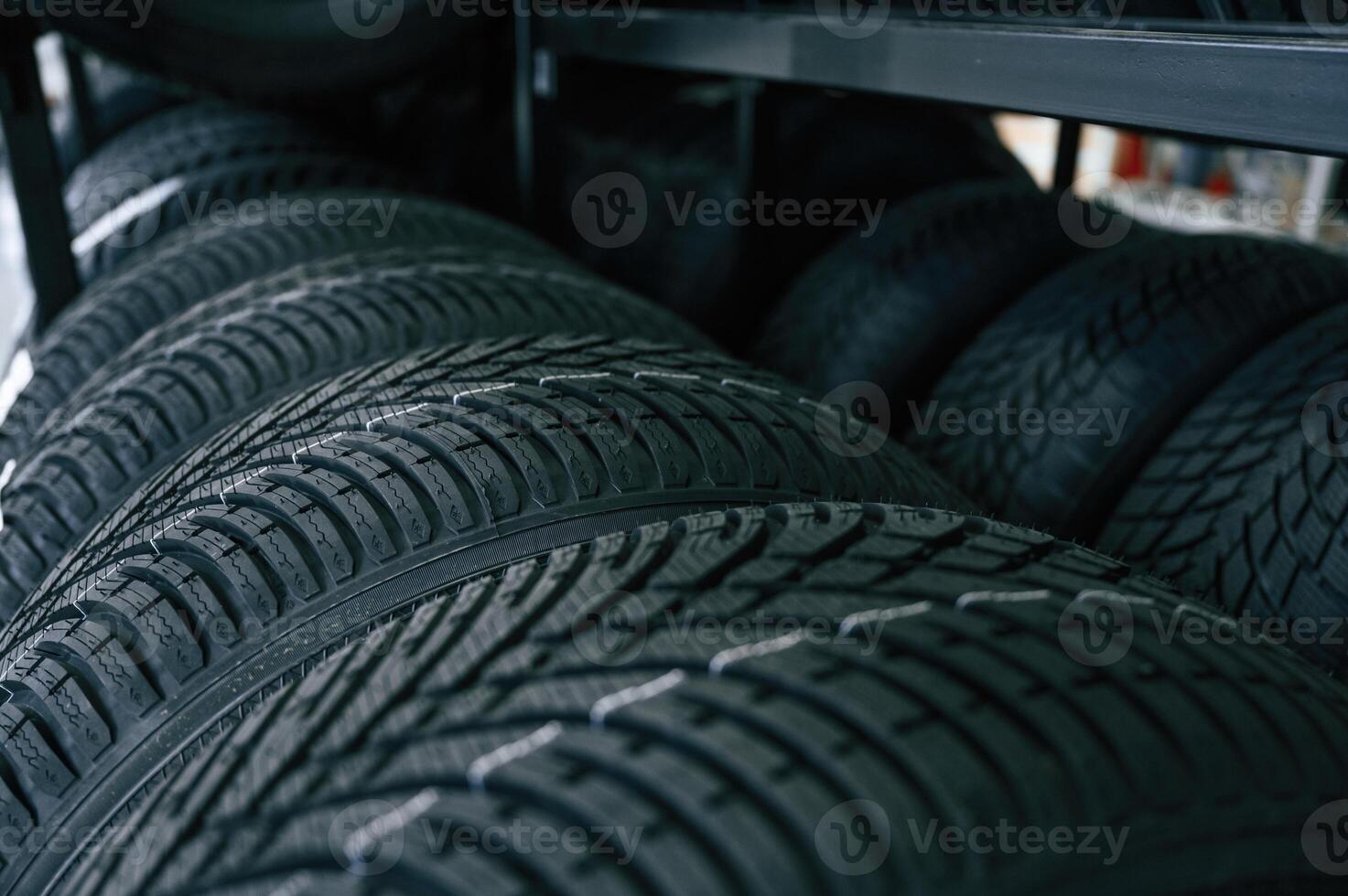 In, the ,right order. New tires are placed on the storage rack in the car workshop photo