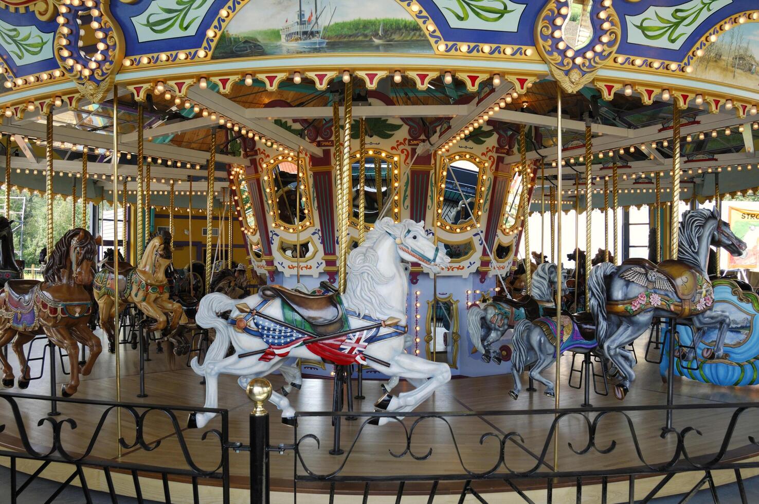 a carousel with horses on it photo