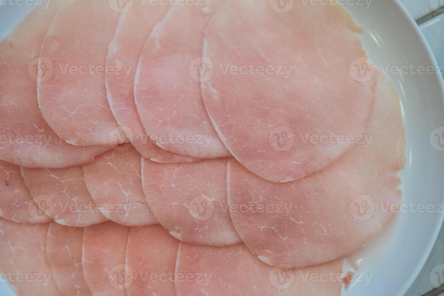 Pork slice, sliced thinly for cooking in pot of boiling water, hot pot, hot pan photo