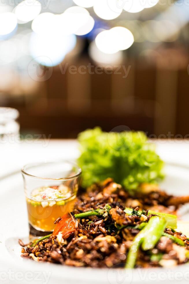 Thai fried organic red brown fried. Fried rice unpolished rice photo