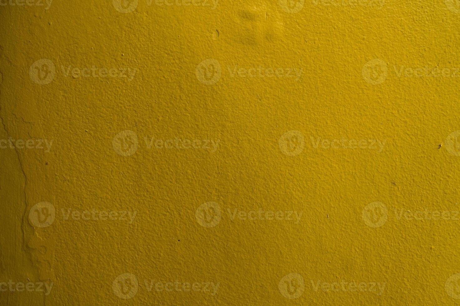 Yellow cement wall texture and background photo