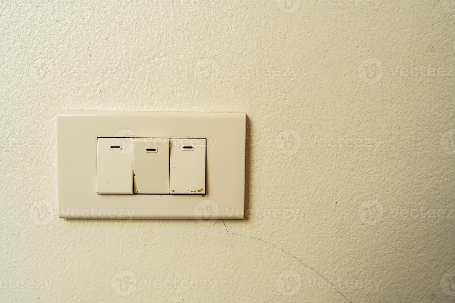 Old white light switch. photo