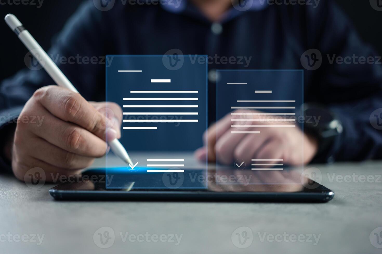 Electronic signature concept, business people sign electronic documents on digital documents photo