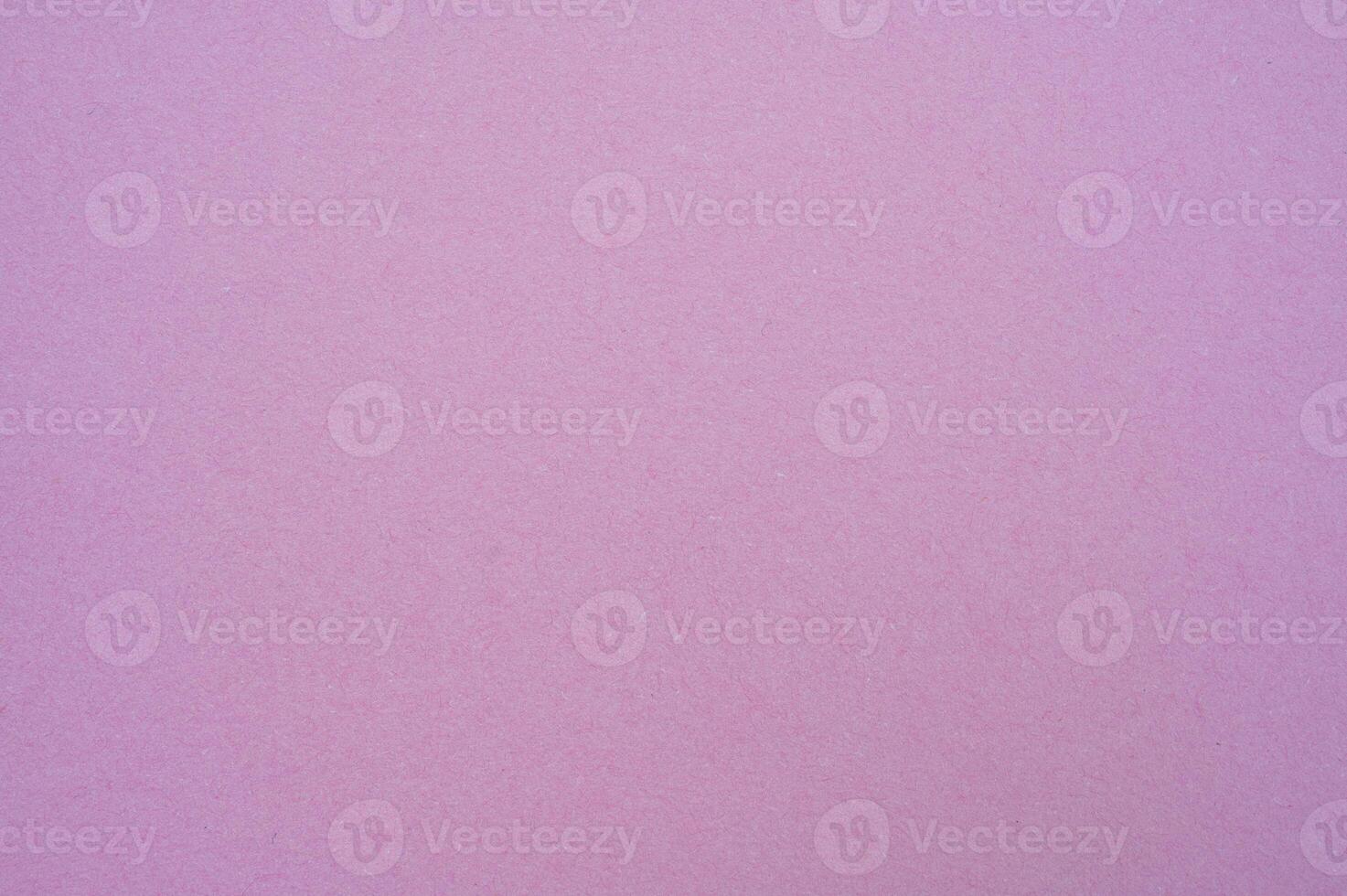 Full frame shot of pink paper sheet texture and background. photo