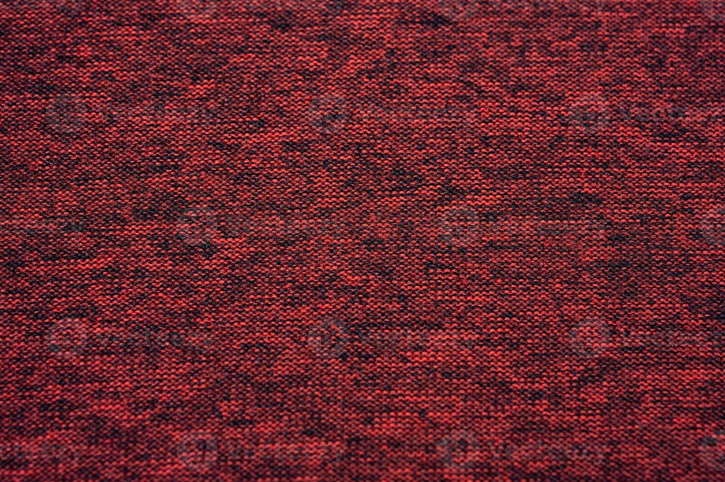 Full frame shot of red recycled polyester cloth texture and background. photo