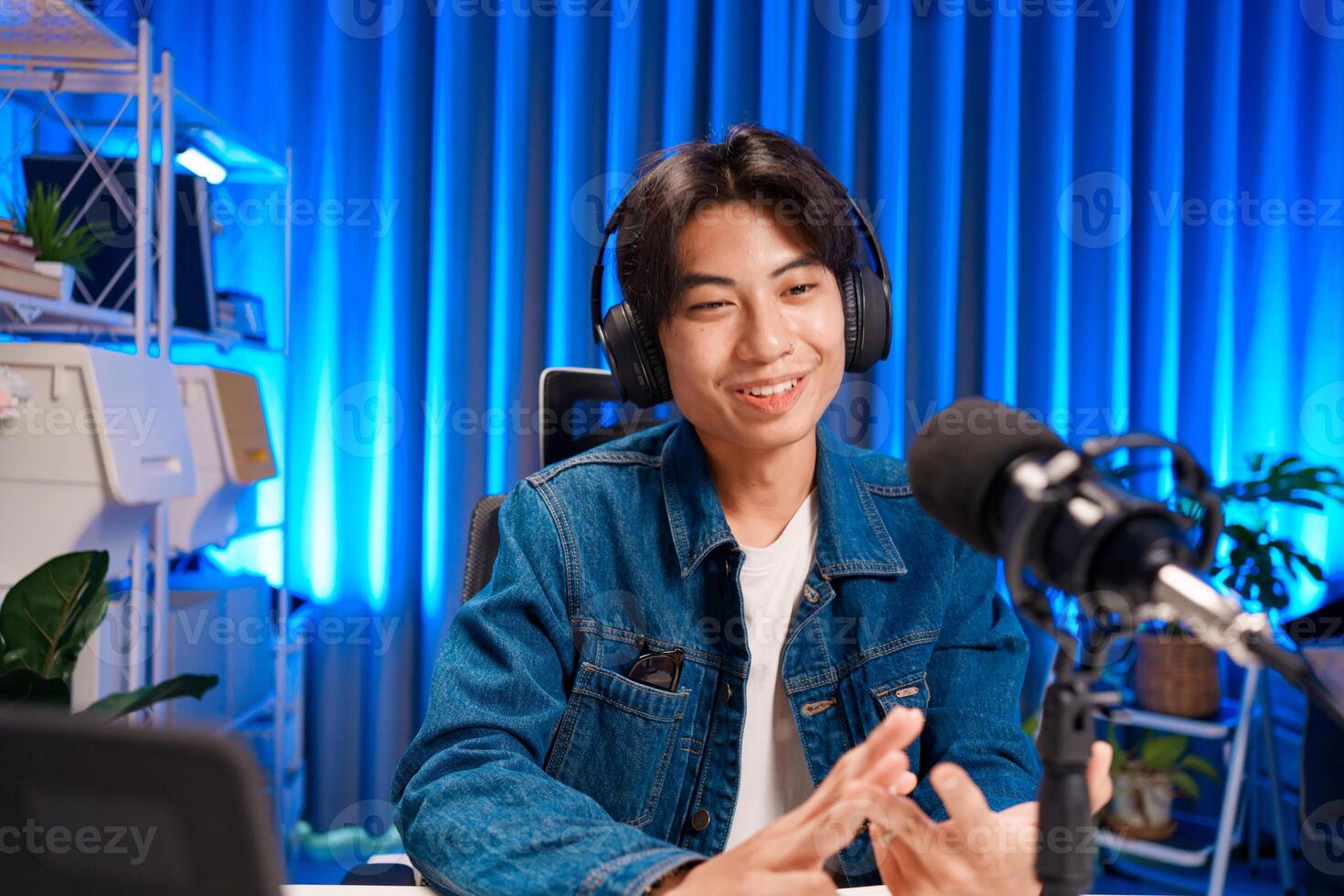 Smiling man sharing thoughts during broadcast photo