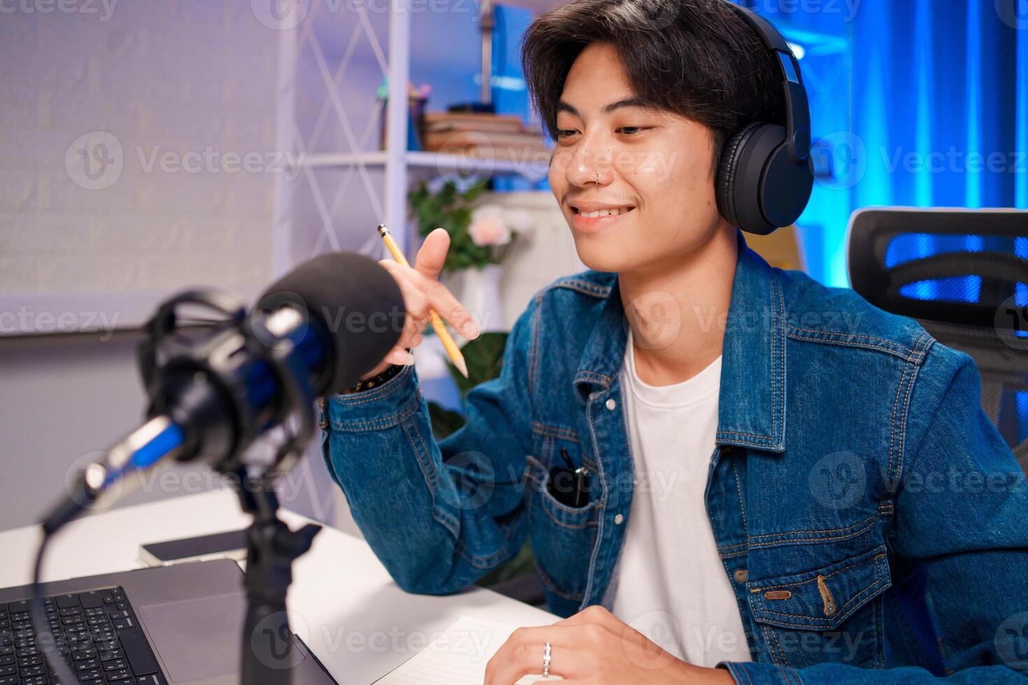 Podcast host smiling during online session photo