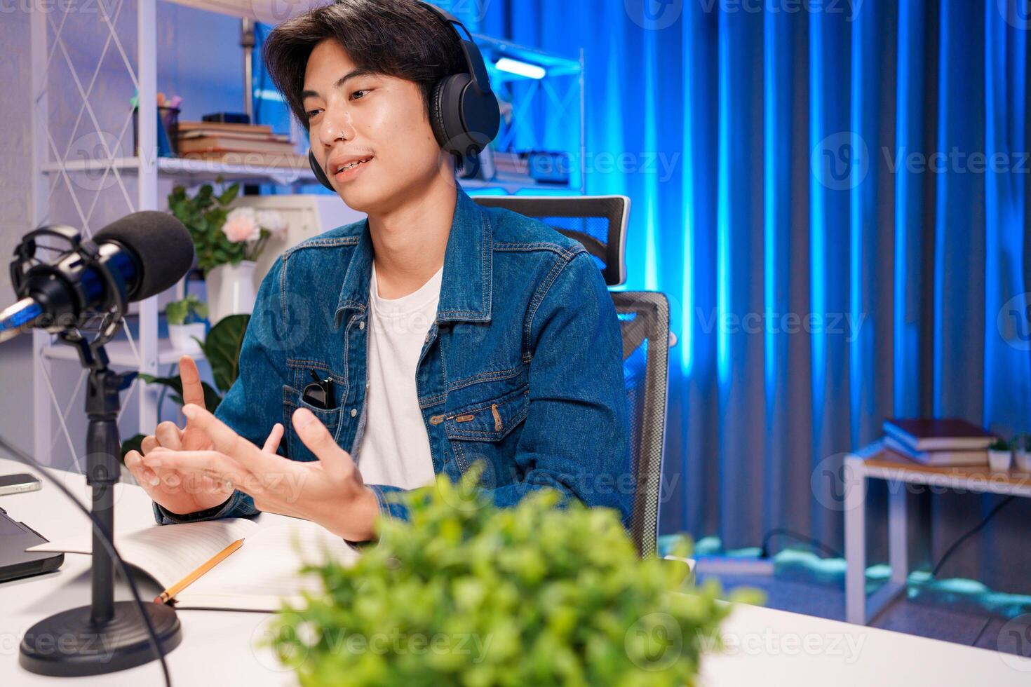 Podcaster explaining ideas during live session photo