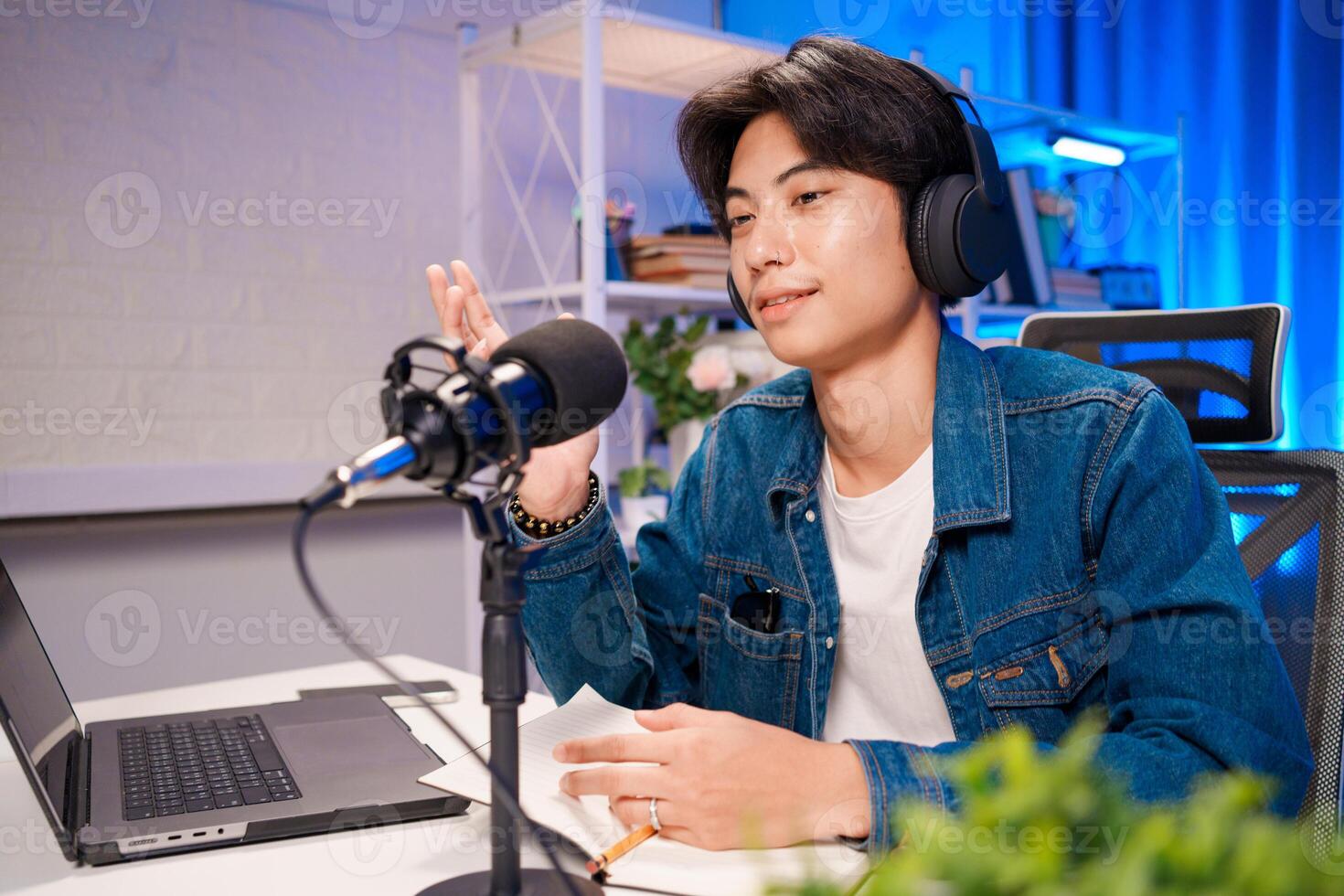 Young man explaining ideas during recording photo